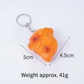 Künstlicher Brathähnchen-Nugget-Schlüsselanhänger mit realistischer Textur und Metallring - Schlüsselanhänger-Stil / Orange