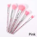 Dettaglio dei manici glitterati rosa e delle setole sfumate sul set di 5 pennelli trucco - Set da 5 / Rosa
