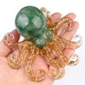 Handmade green crystal octopus figurine with transparent resin and golden flakes - Green Aventurine