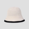 Detailed macro view of beige knit bucket hat texture with contrasting black brim edge - Off White