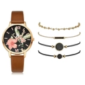 Close-up of women's quartz watch with floral dial and four matching bracelets set - Bracelet / Tan
