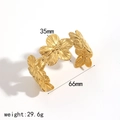 Golden stainless steel five-petal flower bangle with 35mm flower charms and 66mm diameter - Gold Multi-Flower Connected Bangle (TB7136-G)