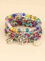Macro detail of Bohemian multilayer beaded bracelets with Tree of Life and leaf charms - Deep Mixed Color 2