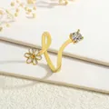 Detail of adjustable gold ring with white enamel daisy and sparkling zircon stone - Adjustable Open / White Flower