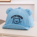 Close-up of cute bear embroidery and 3D ears on a light blue quick-dry baby sun hat - 48cm (6-20 Months) / Blue