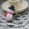 Christmas snowman keychain with black hat and red scarf made of soft PVC plastic - Small Christmas Soft Glue Keychain Black Hat Snowman