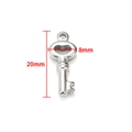 Silver stainless steel key-shaped pendant charm for DIY jewelry measuring 20mm x 8mm - Steel Small Key 8x20mm