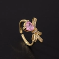 Close-up of pink heart-shaped crystal ring with bow design and gold-plated adjustable band - Heart Bowknot Style