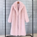 Elegant long faux fur coat in soft pink with wide lapels on a wooden hanger display - S / Pink