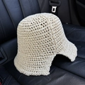 Close-up of beige hollow crochet texture on a foldable summer knit bucket hat - M (56-58cm) / Beige