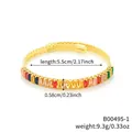 Bracciale dorato con zirconi colorati e misura del diametro interno di 5,5 cm - Zirconia Multicolore Oro