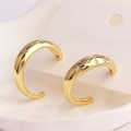 Gold-plated star and moon ear cuff with sparkling zircon accents on white tray - Star and Moon C-Shape Style
