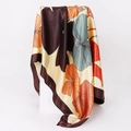 Detailed view of large floral print silk scarf with luxury satin finish and rolled edges - 90x90cm / Yellow (D9223)