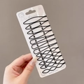 Minimalist black metal hair clip set with geometric wave and oval shapes on display card - 12pcs Mixed Black Set