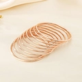 Set of 10 minimalist rose gold stainless steel bangles with smooth 3mm round bands - 9 Rings Rose Gold