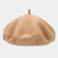 Detailed view of the camel wool beret showing thick fabric texture and round top design - One Size / Light Camel