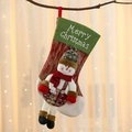 Detail of Christmas stocking with 3D snowman doll and Merry Christmas text on tree - Snowman