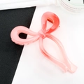Pink ribbon bow hair claw clip with a soft matte gradient finish and sturdy grip - Pink