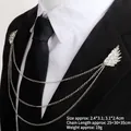 Silver feather wing brooch with metal chains and rhinestones on a black suit lapel - Silver Double Wings Style (TL24014)