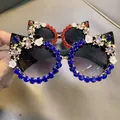 Cat eye sunglasses with luxury blue rhinestones and floral accents for women - Black Frame / Deep Blue Rhinestone