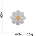 Macro detail of a 4cm daisy flower embroidery patch with white petals and yellow core - No.30 White Daisy
