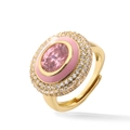 Detailed macro view of an oval pink gem ring with enamel and zircon on a gold band - Gold Pink Enamel Oval
