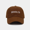 Close-up of white Brooklyn embroidery on deep brown cotton twill baseball cap - Adjustable / Coffee