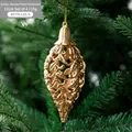 Hollow golden Christmas ball ornaments with filigree pattern for holiday tree decoration - Gold Tapered Ball (4 Pack)