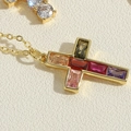 Macro shot of 14K gold plated cross pendant with vibrant multi-colored gemstones detail - Colorful Zirconia Cross (XL2658)