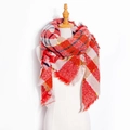 Women's plaid tassel scarf in red checkered pattern displayed on a mannequin - Vermilion Plaid