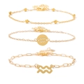 Golden Aquarius zodiac bracelet set featuring paperclip chains and beaded jewelry - Aquarius