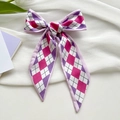 Pink and purple argyle patterned skinny silk scarf styled as a delicate hair bow - Pink Purple Argyle