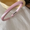 Close-up of pink satin sponge headband texture with soft silk luster on a white background - Light Pink