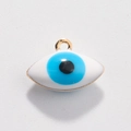 Close-up of golden evil eye charm with blue and white enamel for DIY jewelry making - Style 17-Evil Eye