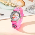 Macro detail of a pink kids quartz watch with 3D butterflies and soft silicone band - Rose Pink