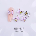 Detail view of purple crystal butterfly nail charm with dimensions 10x12mm for DIY nail art - Shadow Purple + Silver Base