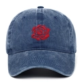 Close-up of red rose embroidery on washed blue cotton fabric of a vintage baseball cap - Navy Blue