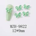 Macro view of 12x9mm mint green cat-eye butterfly nail art charm with silver metal edge - Cat Eye Stone Butterfly Silver Frame Style (9822)