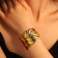 Polished golden open leaf bangle featuring intricate vein textures for elegant women - Autumn Leaf