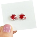 Sparkly red football helmet stud earrings on a card held by a hand with pink nails - Red Glitter Helmet