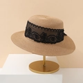 Detailed view of woven straw sun hat with black lace trim on minimalist gold stand - Adult 55-58cm / Khaki