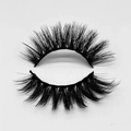 Macro detail of dense black faux mink eyelashes with thick band and dramatic curl - D388N