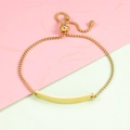 Macro view of adjustable gold-plated box chain bracelet with curved rectangular ID bar - Curved Bar Gold (MP168)