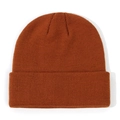 Close-up of a rust-colored knitted beanie hat for toddlers in winter - S (0-2 Years) / Caramel Orange