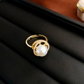 Close-up of golden pearl ring with sparkling zircon halo on black leather display case - Gold Pearl (5#)