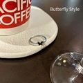 Elegant butterfly ring in silver finish with micro-inlaid stones on a textured plate - Black Enamel Butterfly Ring