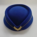 Navy blue flight attendant pillbox hat with gold wheat badge and decorative chain - Blue