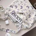 Detailed interior view of white lace tote bag with purple butterfly print and laptop storage - Small Purple Butterfly