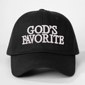 Close-up of white 3D puff embroidery with GOD'S FAVORITE text on black cotton cap - Adjustable / Black