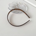 Minimalist acetate hair hoop featuring a classic tortoiseshell pattern on shell tray - Blue Coffee